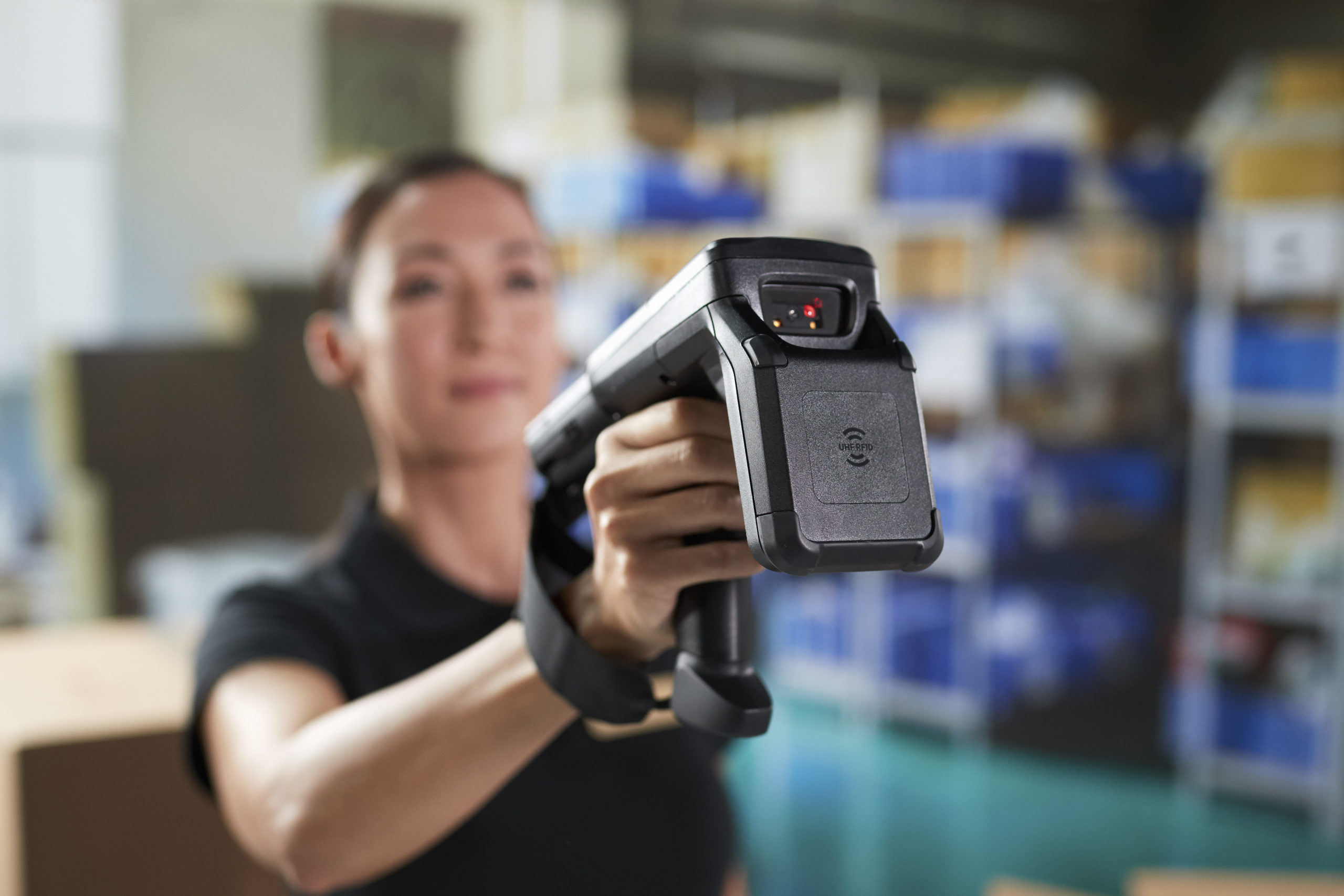 mc3330r-photography-application-back of-store-landscape-woman-scanning IoT technologies to collect and harness intelligent data